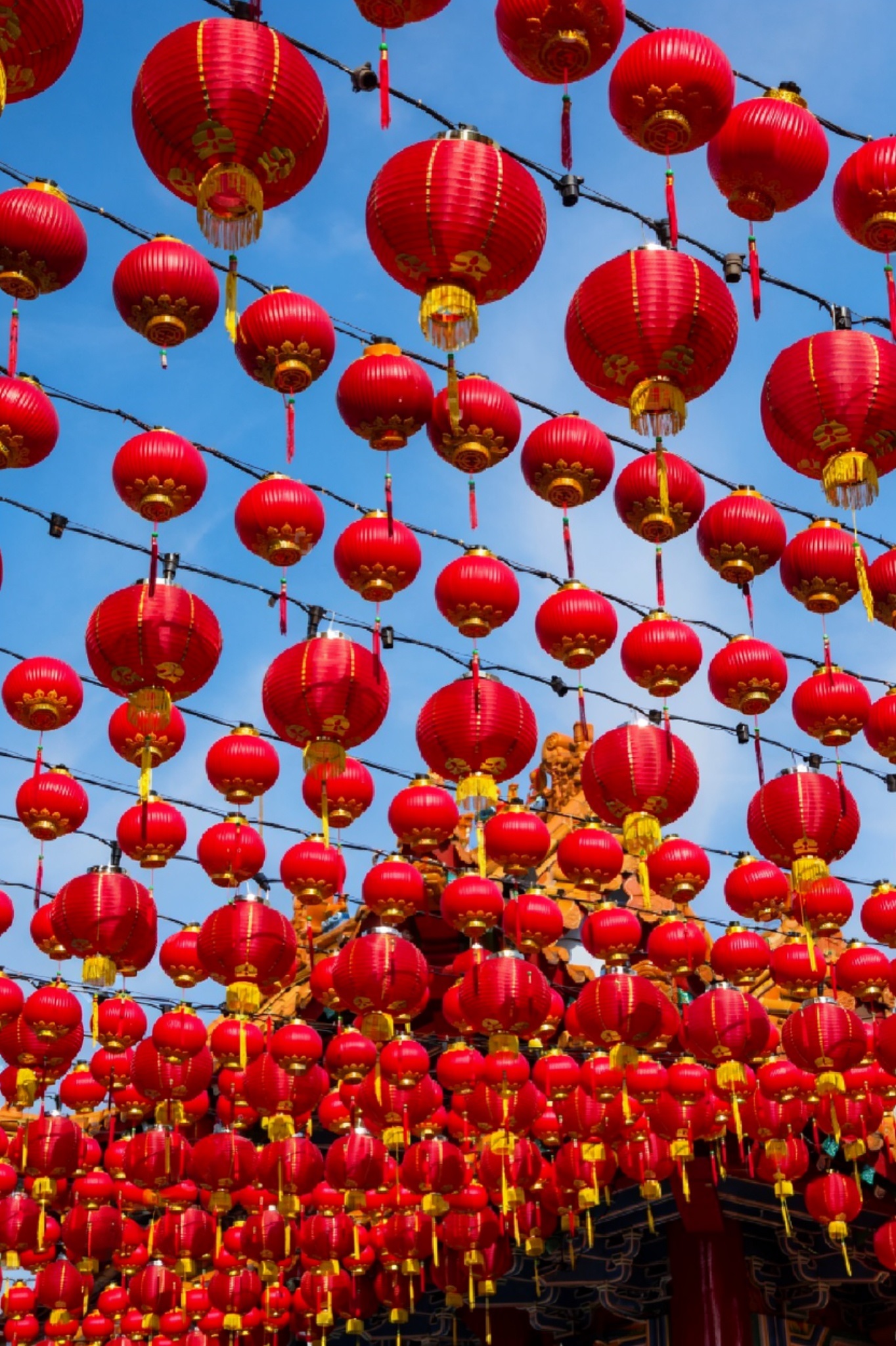 Glowing red Chinese lanterns illuminating the night during New Year's Eve celebrations